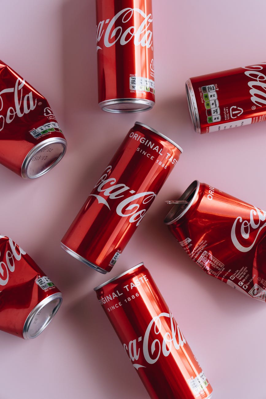 close up photo of crumpled cans