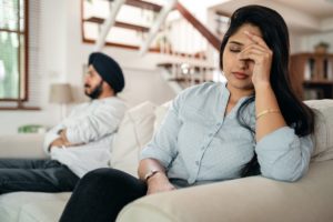 A young man and woman seem to be upset after having yet another fight. Their relationship is one that maybe would be better if it ended.