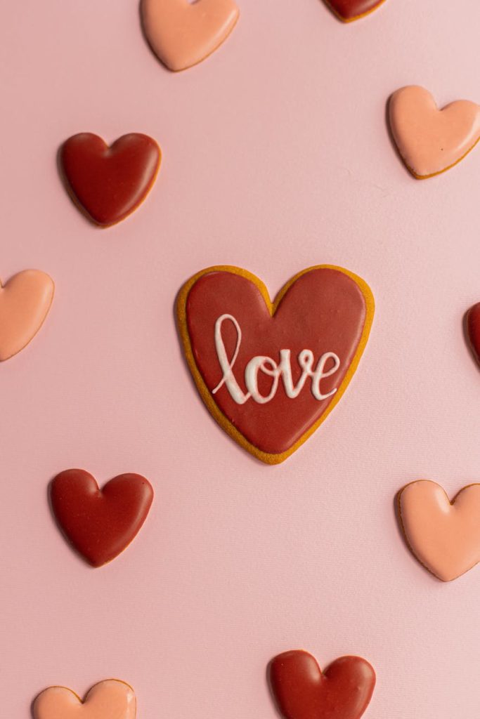 Hearts with the word "love" on them. We usually associate this with romantic love.